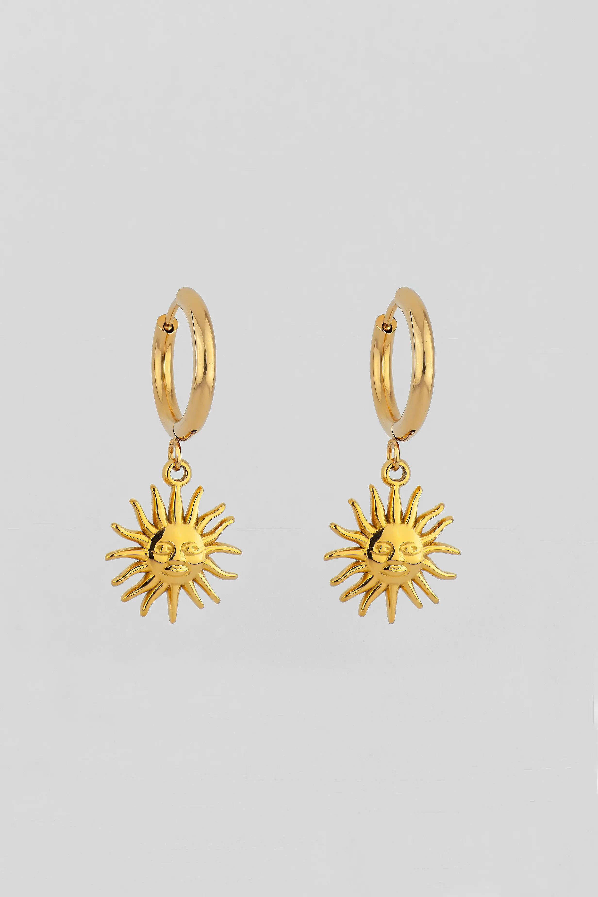 PENDIENTES AROS CON SOL 1
